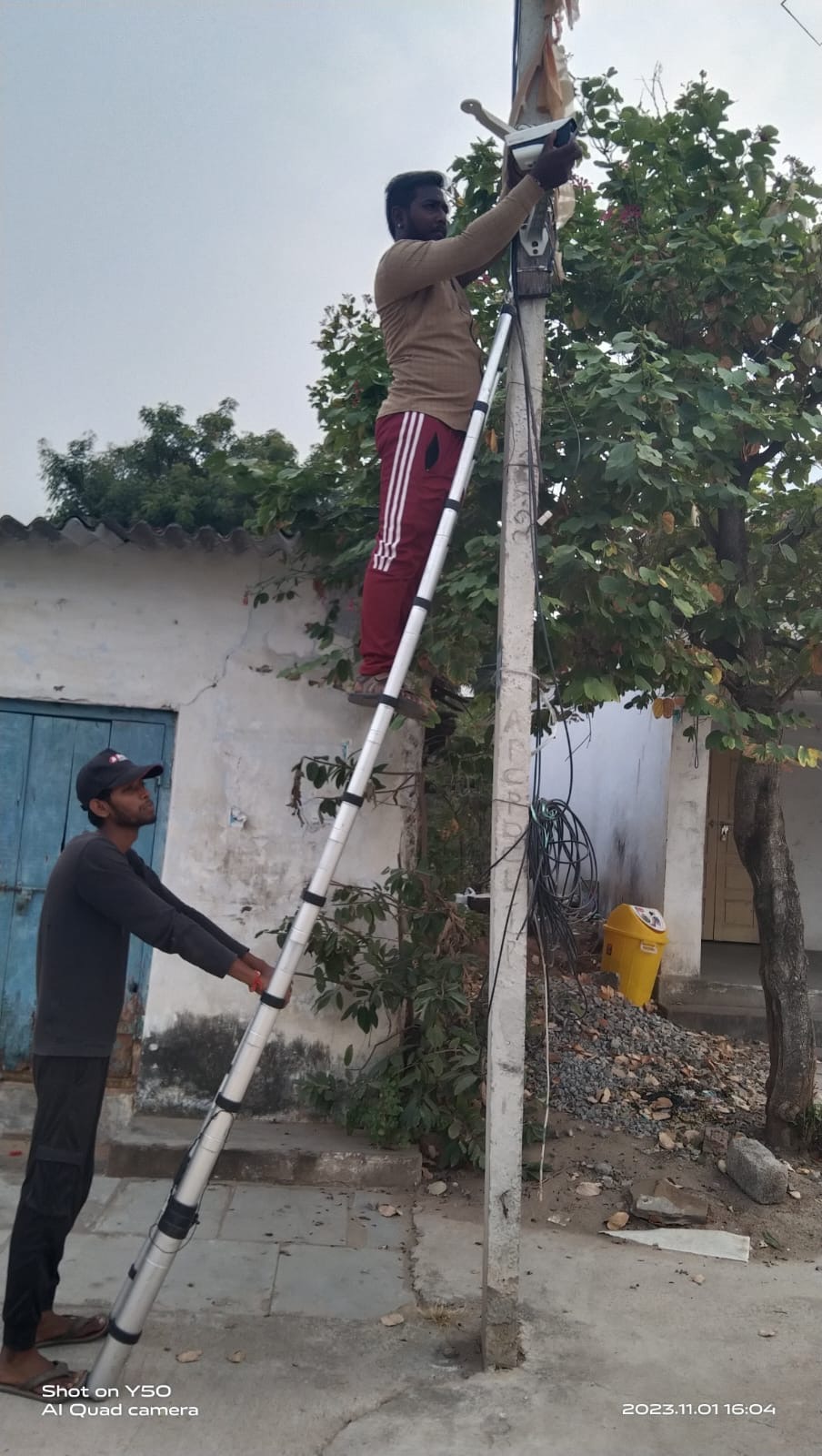 SLNS team installing a pole-mounted outdoor CCTV camera