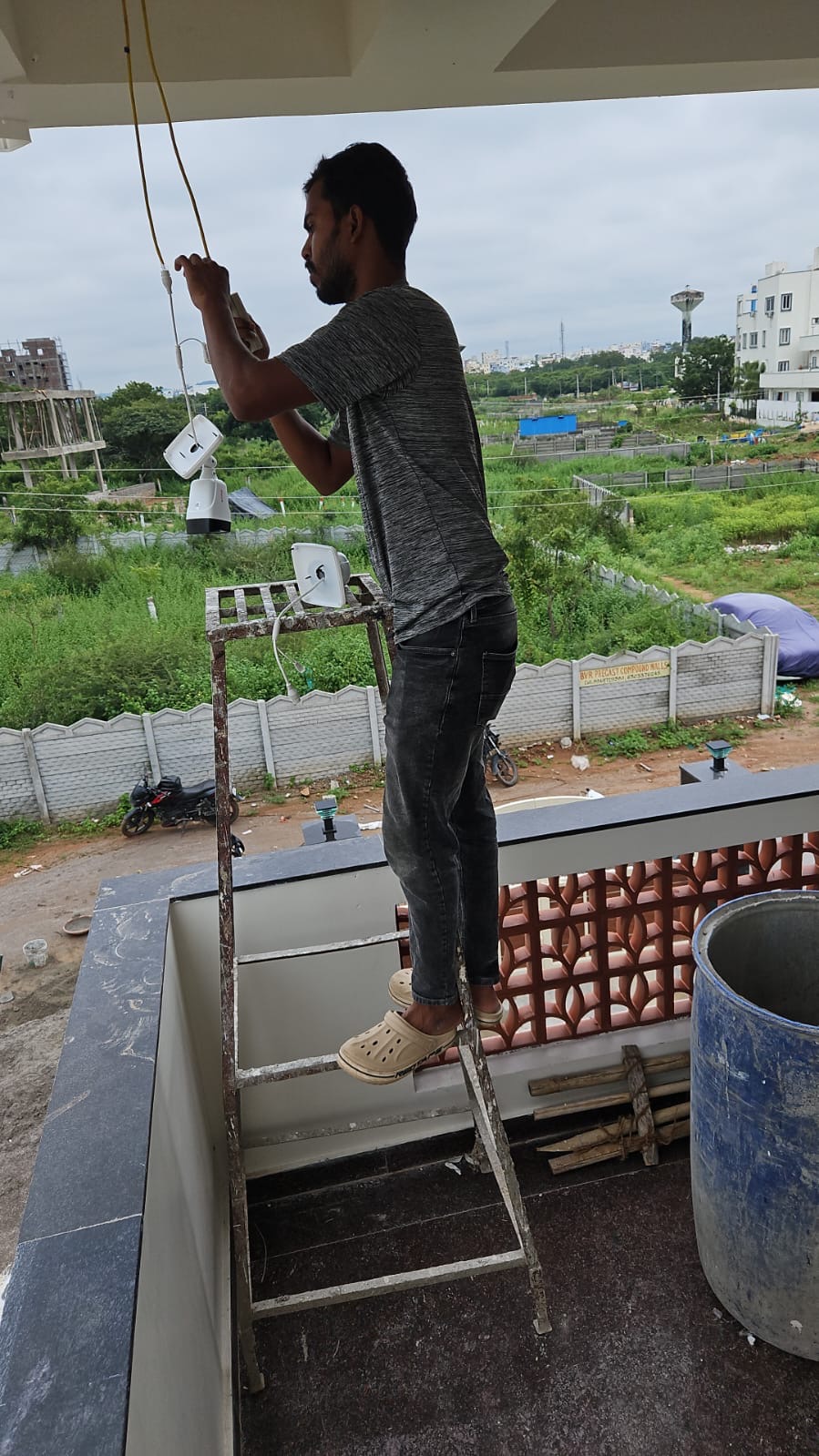 SLNS balcony camera wiring and outdoor CCTV setup work