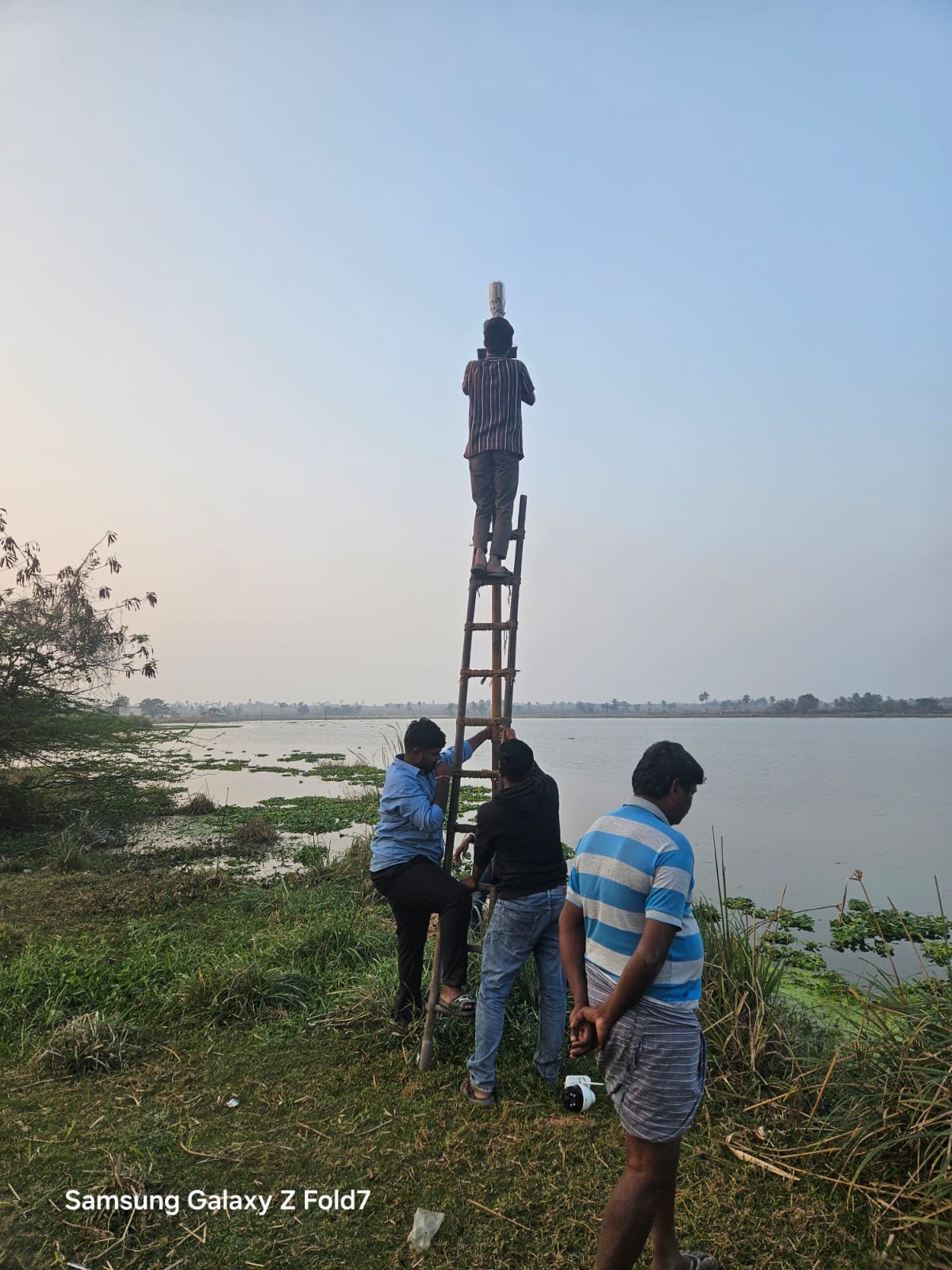 SLNS outdoor field camera installation beside a lake